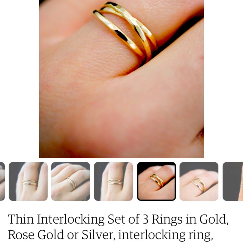 SEARCHING FOR: Interlocking gold rolling ring